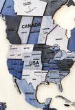 Load image into Gallery viewer, Blue world map wooden wall art with 3D layered design for modern interiors